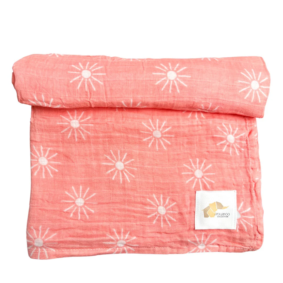 Couverture mousseline de coton - Soleils rose saumon